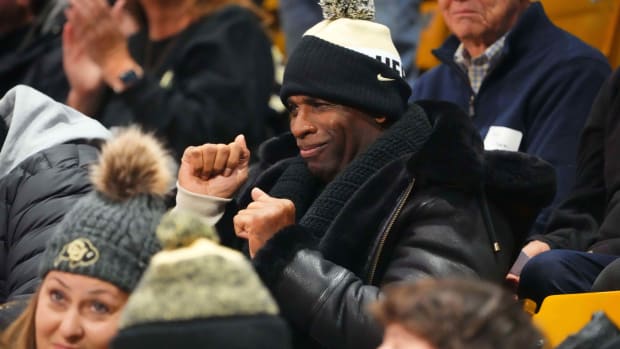 Jan 13, 2024; Boulder, Colorado, USA; Colorado Buffaloes football head coach Deion Sander dances in the first half of the game against the USC Trojans at the CU Events Center